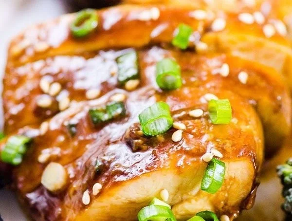 Easy honey garlic chicken served with vegetables on a plate