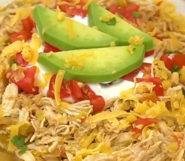 Instant Pot chicken fajitas served with fresh vegetables and tortillas