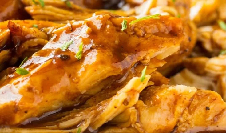Slow cooker brown sugar balsamic chicken prepared and served on a plate