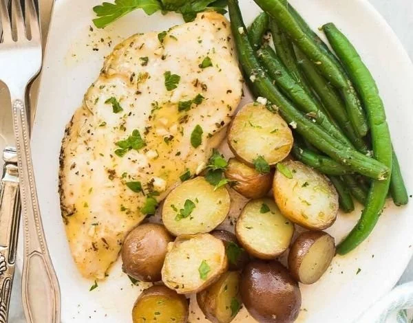 Delicious slow cooker garlic butter chicken with potatoes ready to serve